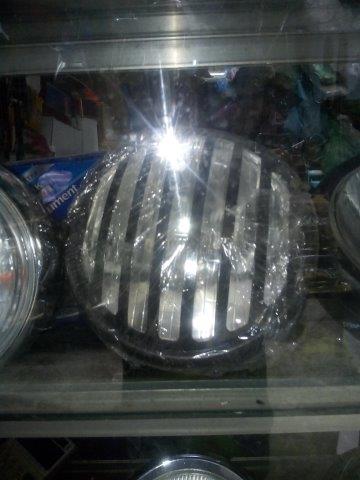Round headlight with case
